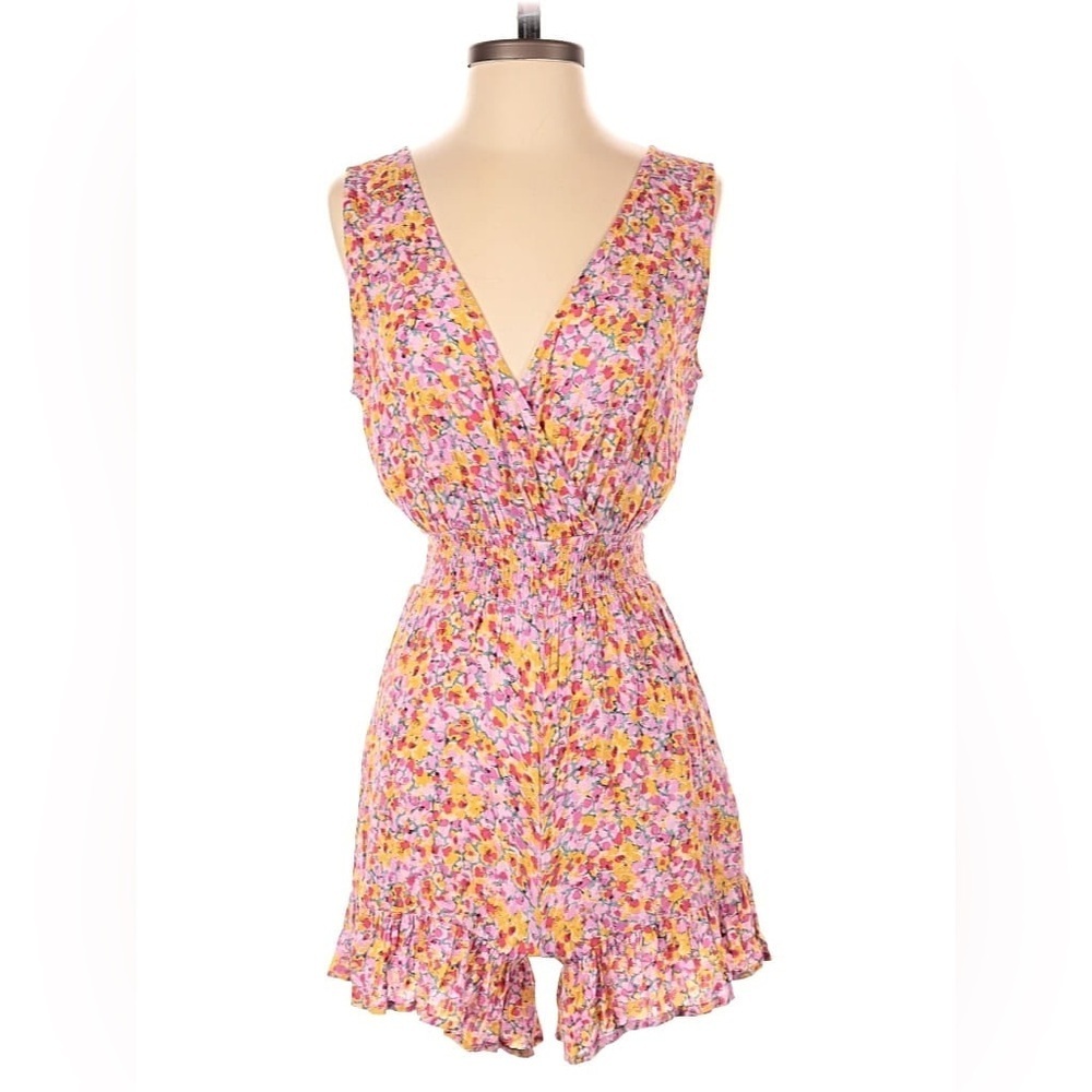 Rewind floral sleeveless romper perfect for a relaxing day in the sun